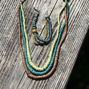 Wooden necklace and bracelet set. Dyed coconut wood and other wood.